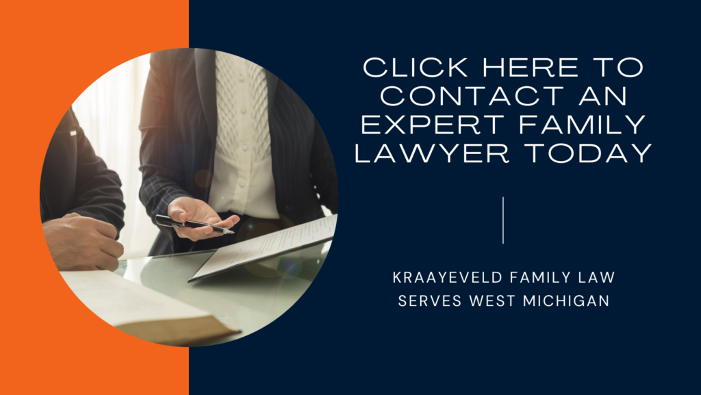 Graphic showing two people from the shoulders down go over documents. It has text to the right encouraging viewers to click the graphic to contact Kraayeveld Family Law in West Michigan. 