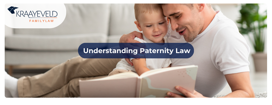 Unmarried father playing with his toddler son, making use of his right as stated in MI Paternity Law